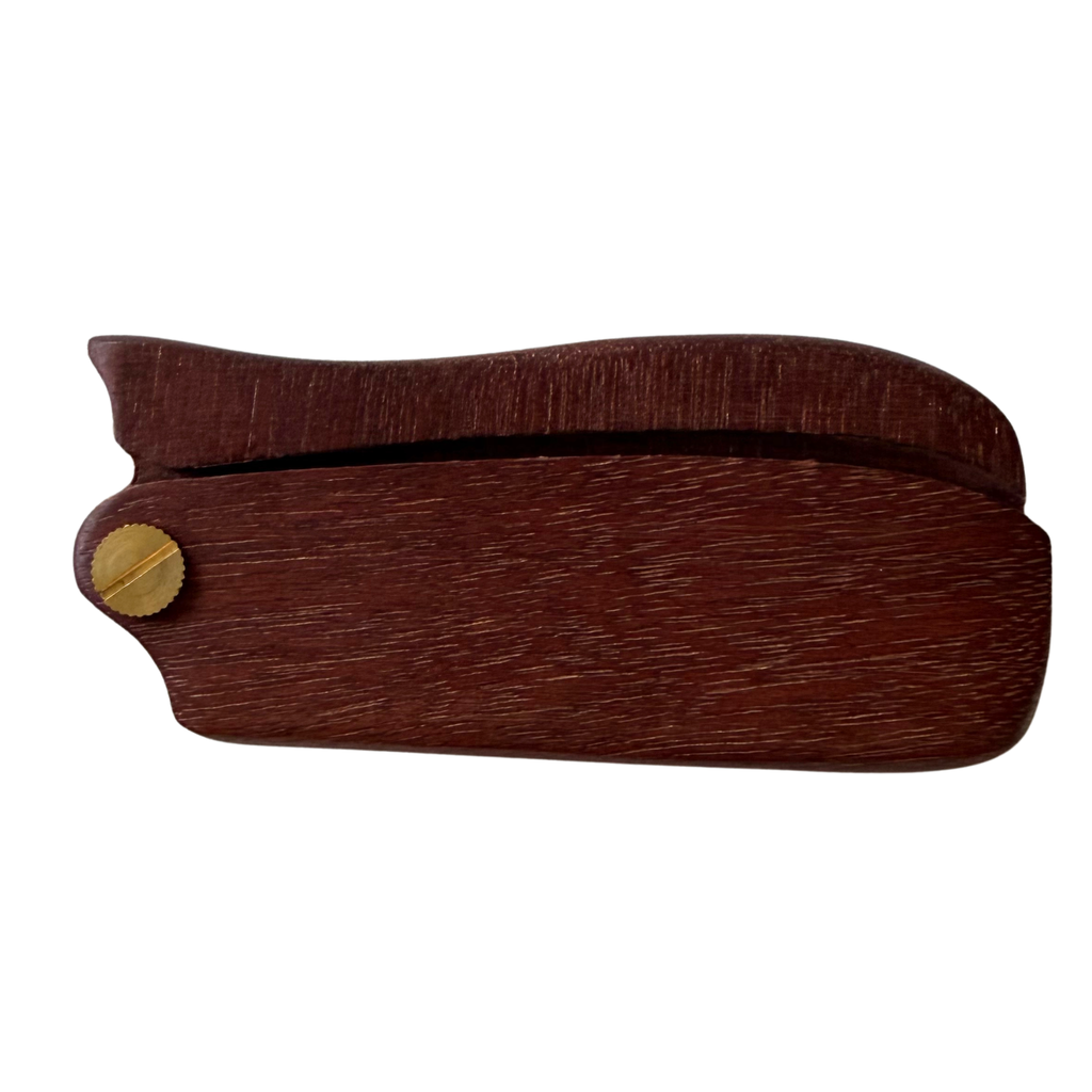 A dark reddish-brown wooden comb guard with a small brass screw fastener on the side, shown against a plain white background.