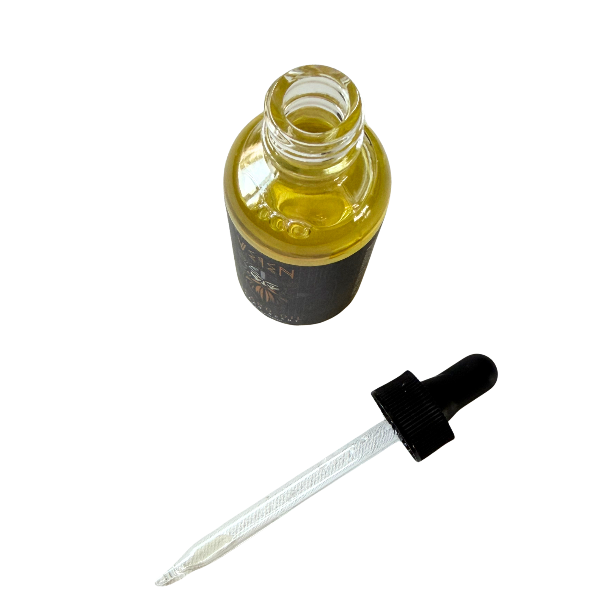 A small clear glass dropper bottle filled with yellow oil, shown next to a separate clear glass dropper with a black rubber bulb on a white background.