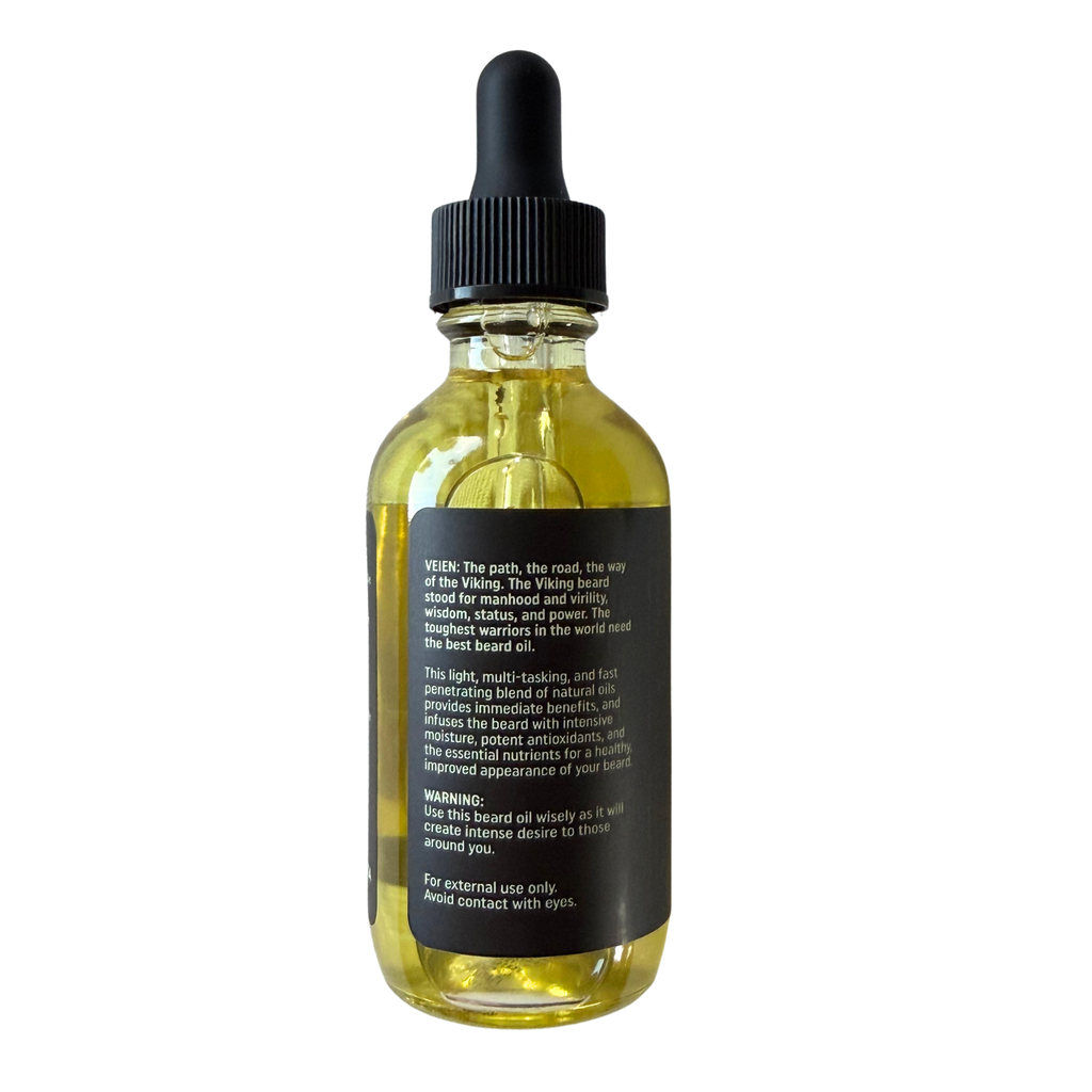 A clear glass dropper bottle filled with yellow oil, featuring a black ribbed cap and a black label with white text, shown against a plain white background.