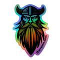 An iridescent holographic sticker featuring a stylized Viking head with a long beard and horned helmet, shown on a plain white background. The sticker has a black base with a rainbow holographic finish and the text 'thevielen.